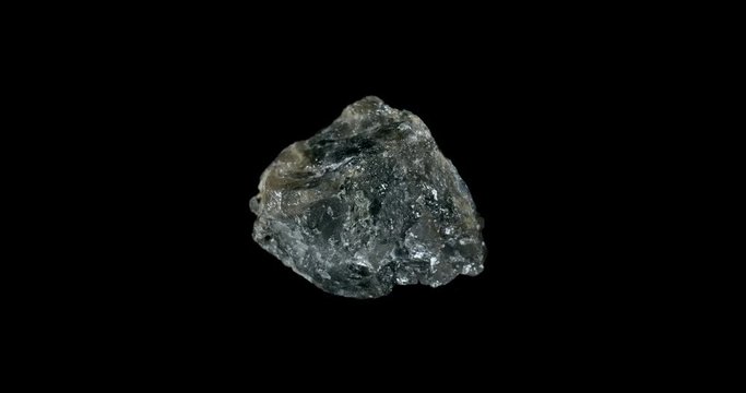 Raw Blue Cordierite Turning on Black