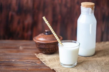 Homemade kefir, yogurt with probiotics in a glass on table Probiotic cold fermented dairy drink Trendy food and drink Copy space Rustic style.