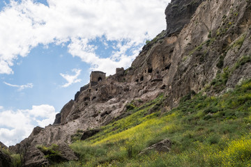 Fototapeta premium Vardzia is a cave monastery site excavated from Erusheti Mountain on the left bank of the Mtkvari River, near Aspindza