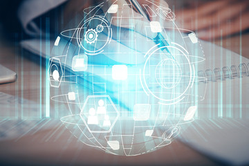 Social network theme hologram over hands taking notes background. Concept of global international people connect. Double exposure