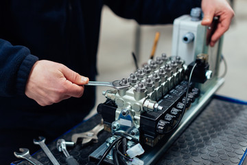 Reparing an engine in the factory.