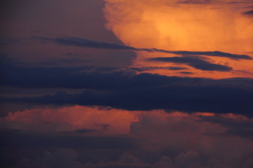 Beautiful blue orabge sunset in the clouds - summer evening view