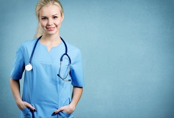 Young man doctor holding stethoscope