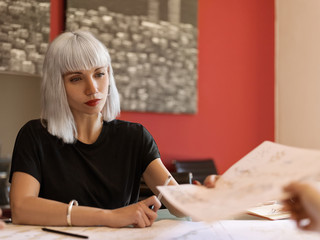 Beautiful woman in office with coworker