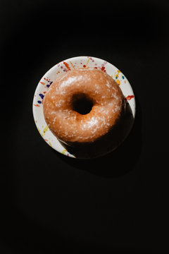 View from above of a donuts on a black background