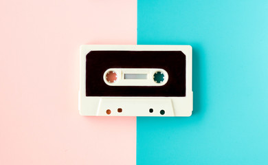 old cassette for tape recorder in happy pastel colors background