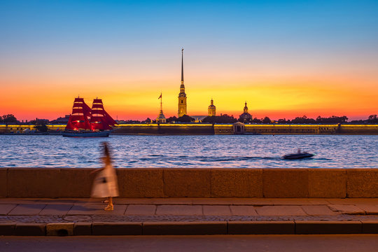 Saint Petersburg. Holiday Scarlet Sails. Russia. Sailboat sailing on the Neva River. Rasvet the sun on the background of the Peter and Paul Fortress. Holidays in the Russian Federation.
