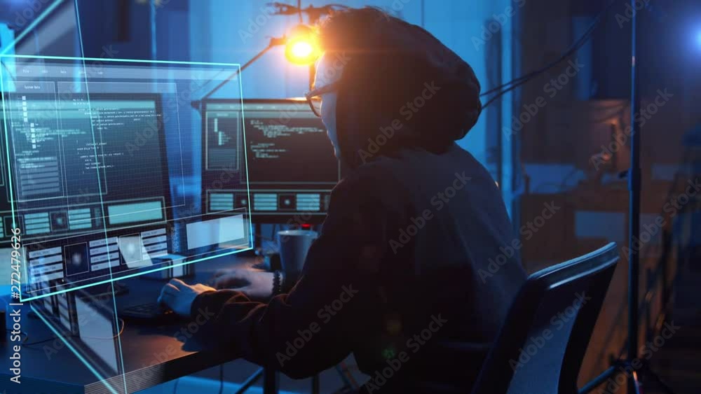 Poster cybercrime, hacking and technology concept - asian male hacker in dark room writing code or using co