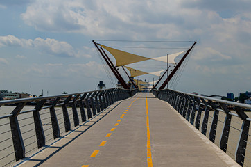 modern pedestrian bridge over the river guayas.guayaquil ecuador