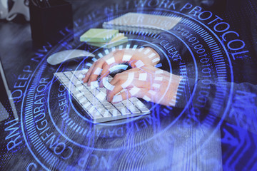 Double exposure of technology hologram with man working on computer background. Concept of big data.