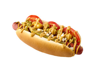 Tasty hot dog with tomatoes and pickled relish on white