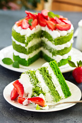 Cake with spinach, cream and strawberries. Valentine's Day.