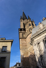 Side view from the bottom and the details of Aachen Cathedral. Facade of Aix-la-Chapelle, Roman...