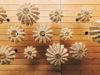 Stylish Interiors - Braided Lamps Against Wooden Ceiling