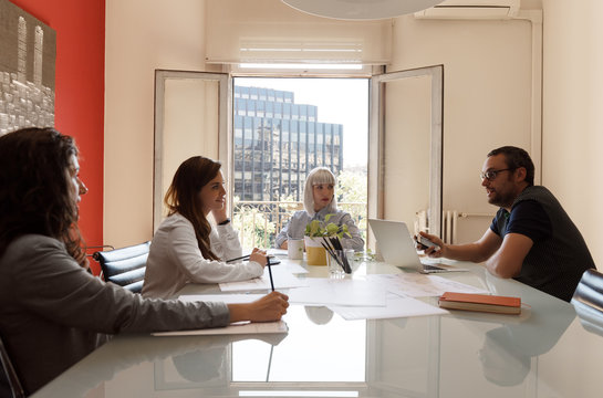 Group of people having conference in hall