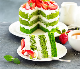 Cake with spinach, cream and strawberries. Valentine's Day.