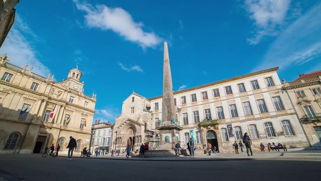 Arles, Provence, France. Place de la Republique, main square of the city. Unidentified people passing in a time hyper lapse video
