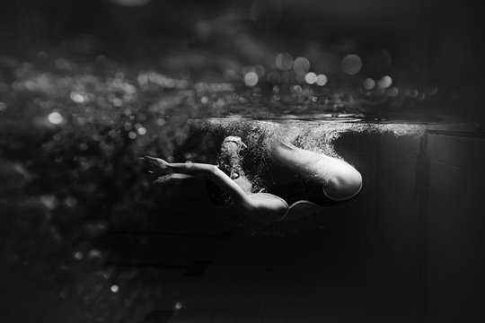 Underwater professional swimmer.