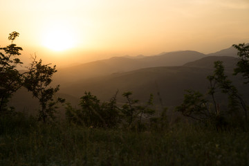 Beautiful landscape in the mountains with the sun at dawn. Mountains at the sunset time. Azerbaijan Caucasus Mountains. Agsu pass. Baskal. Nature