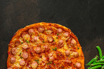 pizza sausages, green peas, tomato sauce, cheese (set of ingredients for cooking). food background. top view. copy space