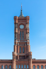 Front iew of the clock tower of Red City Hall in Berlin