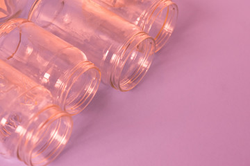 Pink jars on a pink background with room for text