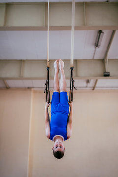 Young boy practicing on the rings