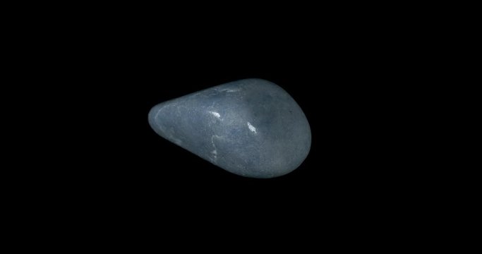 Blue Quartz Mineral Turning on Black