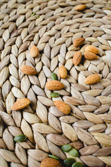 almonds nuts on a natural wicker napkin