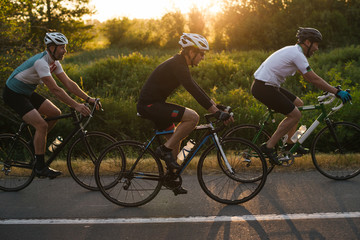 Group road bike ride in nature