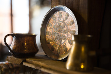 Copper plate handcrafted, traditionally made in Lagich, Azerbaijan. Handmade plate in souvenir shop.