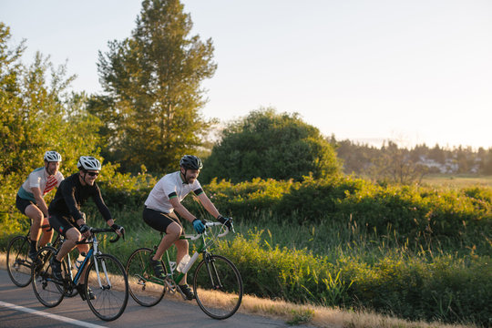 Group road bike ride in nature