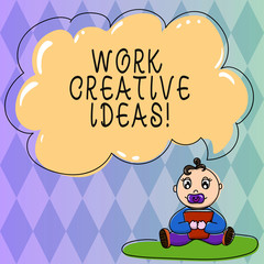 Text sign showing Work Creative Ideas. Conceptual photo has ability to invent and develop original thoughts Baby Sitting on Rug with Pacifier Book and Blank Color Cloud Speech Bubble