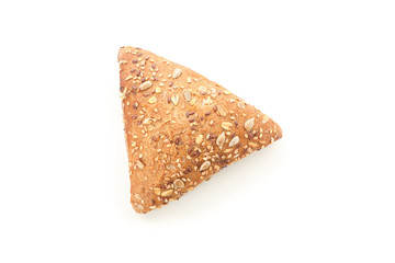 Triangular bun isolated on white background, top view. Bakery products