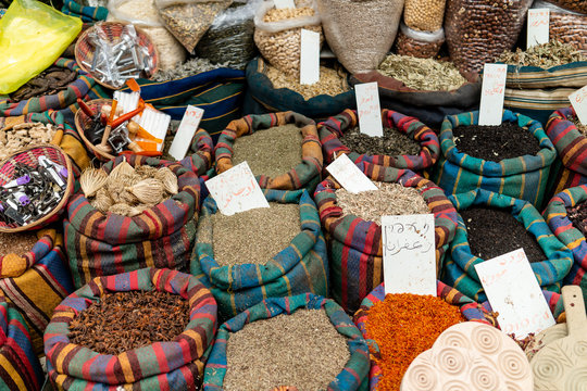 Fresh and colorful spices sold in an open air market while sightseeing in Tel Aviv, Israel.