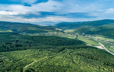 Fototapeta na wymiar A village in the mountains. Photo from drone.