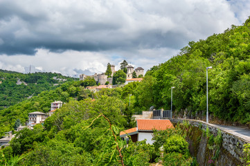 Fototapeta na wymiar Rijeka, Croatia: Trsat castle sourrounded by green trees.