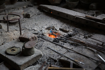 Coppersmith workshop and hand made copper things, Lahich, Azerbaijan. Interior of coppersmith workshop in the village.