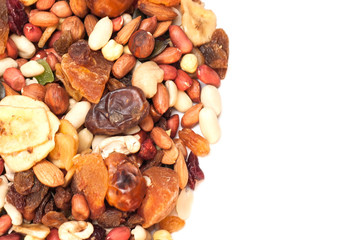 Dried fruits - bananas, figs, dried apricots and nuts on a white background. Copy space
