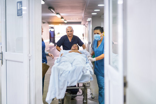 Patient on a stretcher brought by ambulance