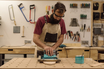 Man working with pallet and deck