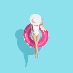 Top down aerial view of summer float doughnut inflatable toy in pool. Summer vacation concept.