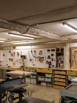 Spacious workshop with tools on wall