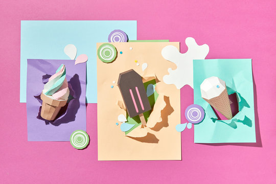 Flat lay paper origami: chocolate ice cream, in a waffle cone an