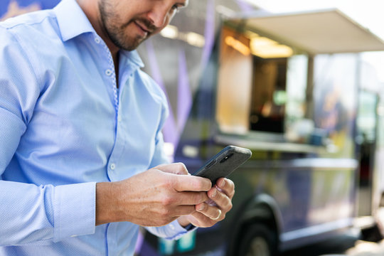 Food Truck: Man Uses Mobile Ordering For Food Truck