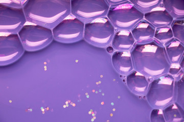 Bright Purple Bubble Cells Background Texture. Hive like pattern with a fun purple background. Interesting abstract texture full of hexagons.