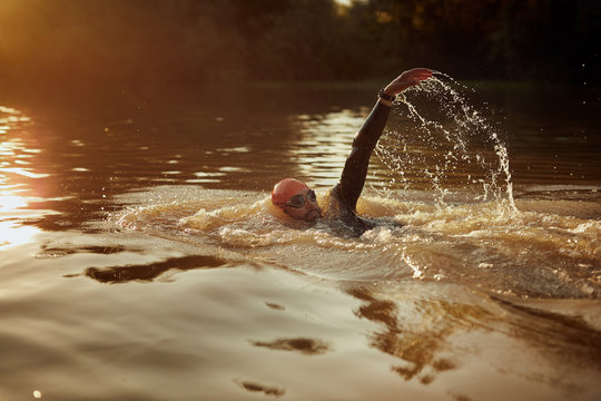 Man Swimming backstroke.