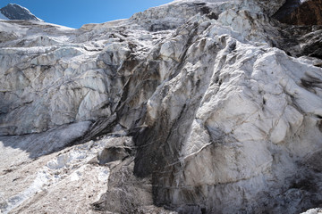 Mountain glaciers and large blocks of snow with ice in the eternal glaciers in Alibek, Dombay, Karachay-Cherkess Rep. Russia