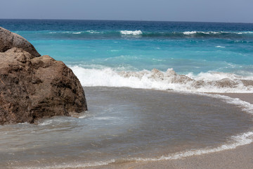 Fototapeta na wymiar Canary Islands brown sand beach turquoise water