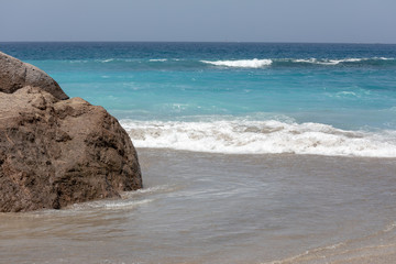 Canary Islands brown sand beach turquoise water